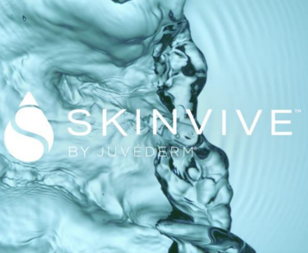 Video thumbnail of SKINVIVE™ patient Nadia smiling as she is  splashed with water, with her skin looking smooth and radiant.